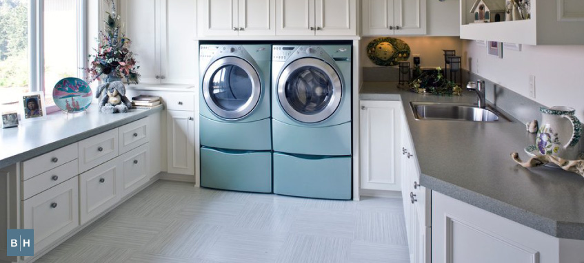Images of washer and dryer in a laundry room